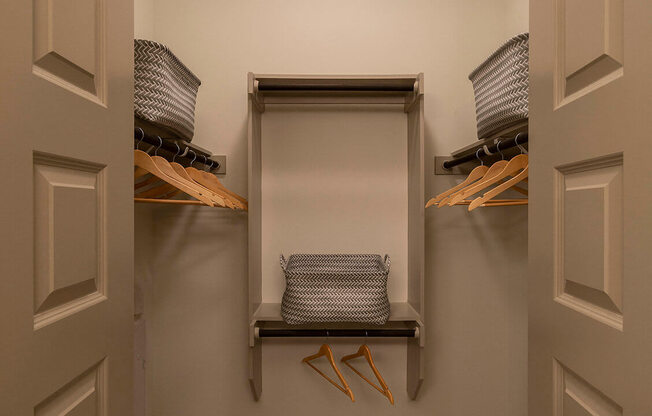 A hallway with a light on and a door on the left.