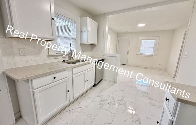 Spacious 4 Bedroom, 2 Bath Home with Outbuilding Storage and Fantastic Outdoor Living!