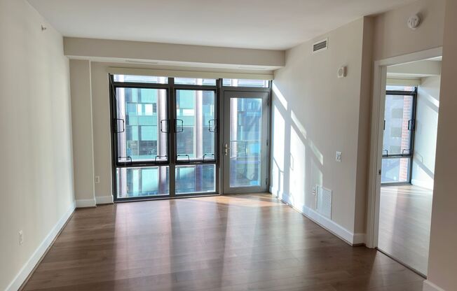 Stunning 2 bed (Primary bedroom + den w/closet), 2 bath condo located in the heart of downtown Bethesda.