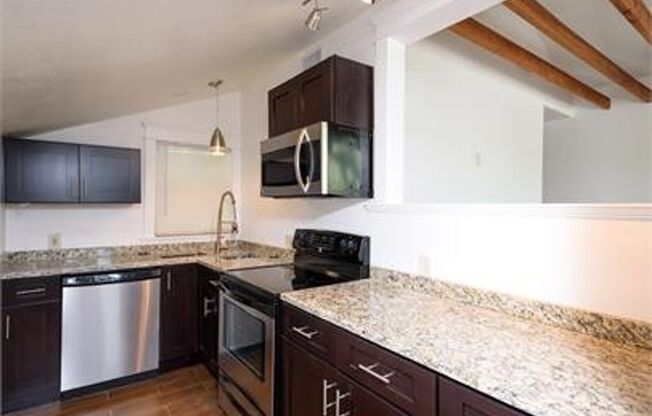 CHARMING 2 BEDROOM, 1 BATH HOME WITH SPACIOULS COURTYARD