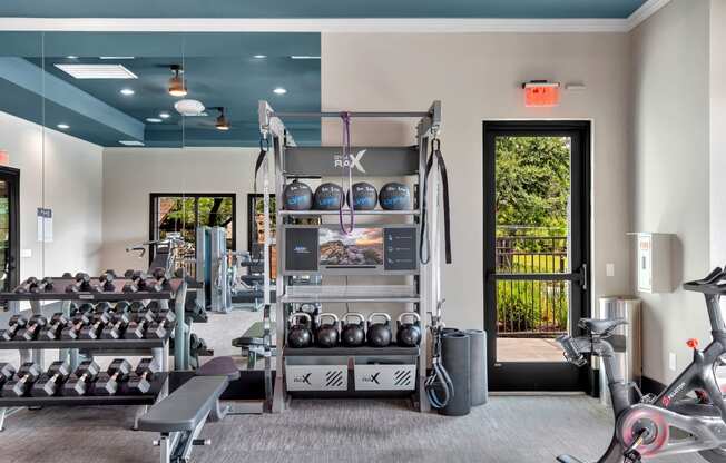 a fitness center with weights and other exercise equipment