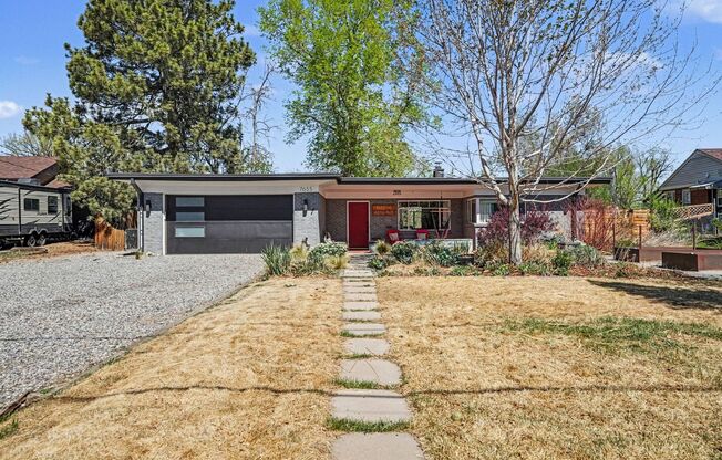 Sunlit Wheat Ridge Gem with Huge Wooded Backyard