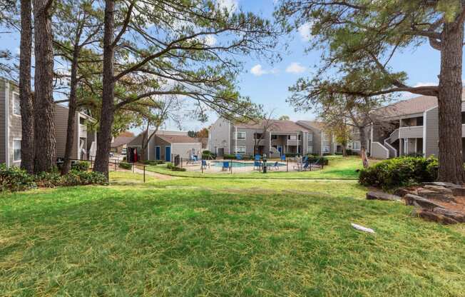 our apartments have a large yard with a swimming pool