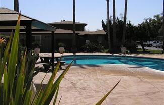 Upstairs 2BD/1BA Condo with 1 reserved covered parking, HOA pool, new paint, new flooring, in Lakeside.