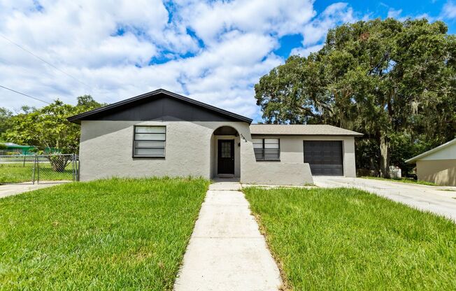 Nice Block home on corner lot 3bdrm/1bath home with attached garage, shed and large fenced yard