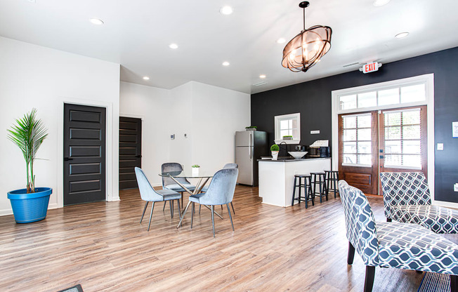 Spacious Clubhouse featuring seating areas and hardwood flooring at Parkside at Sandy Springs