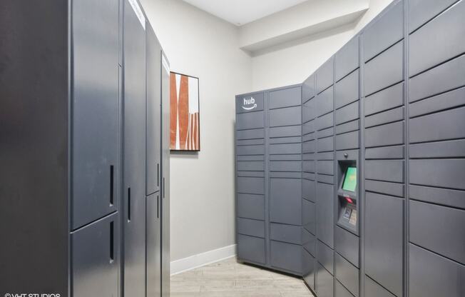 a row of lockers in a room with a privacy door