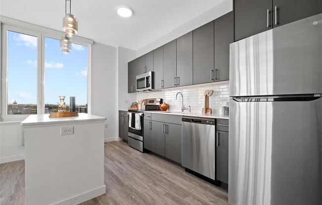 Modern kitchens with sleek stainless steel appliances at The Brick of Hackensack, Hackensack