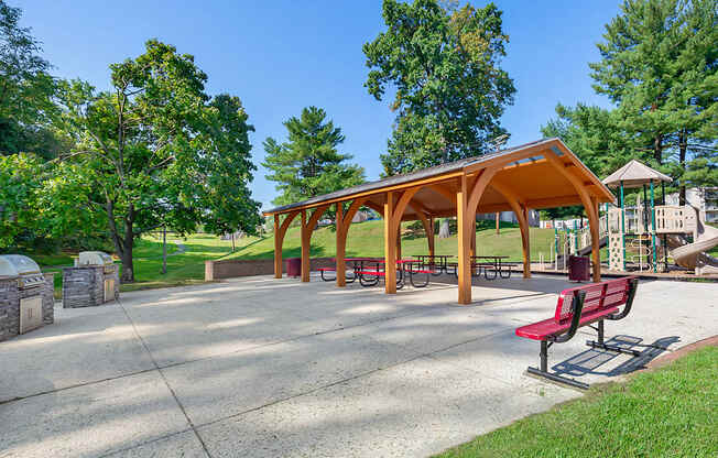 a park with benches and a picnic shelter at Copper and Quarry Village, Maryland
