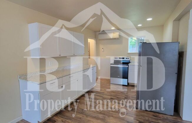 Centrally Located Bremerton Home With Partial View of Sinclair Inlet from Deck