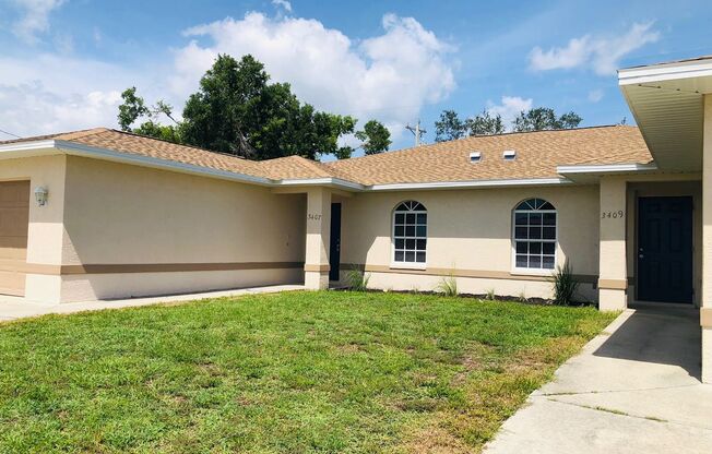 3 Bedroom 2 Bath SW Cape Coral Duplex with Garage and Screened Lanai
