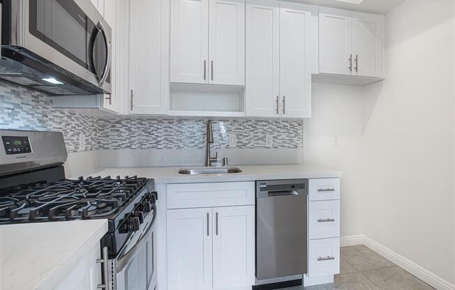 Fully Equipped Kitchen Includes Frost-Free Refrigerator, Electric Range, & Dishwasher at Hollywood Vista, Hollywood, California