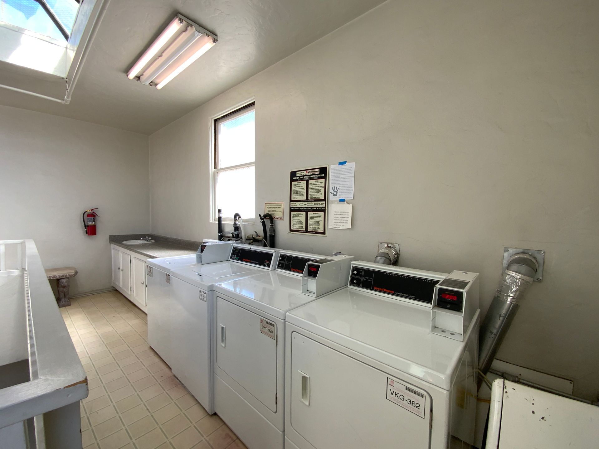 TOP FLOOR! Corner Unit w/ On-Site Laundry & Parking Available!