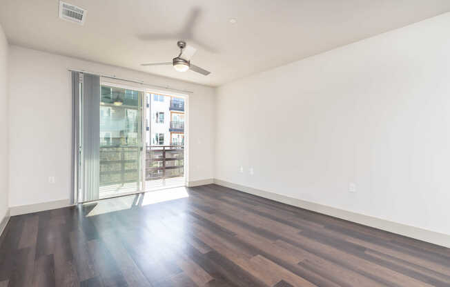 Living Room with Balcony and Hard Surface Flooring