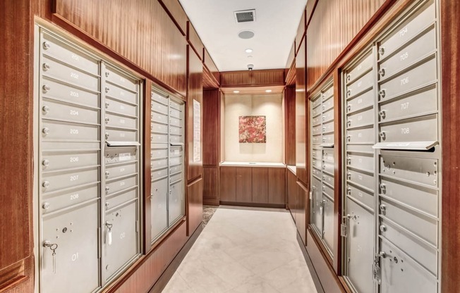 the walk in closet has plenty of filing cabinets and drawers