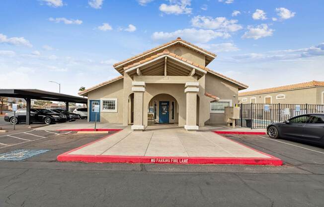 A building with a red "NO FUNNY PLAY FIRE LANE" tape in front of it.