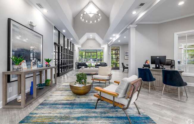 A modern living room with a large rug and a wooden chair.