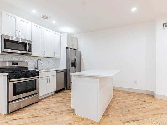 282 E 38 ST