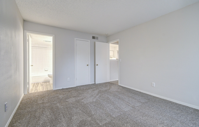Fresh carpeting in bedroom at Rainbow Ridge Apartments in Kansas City, Kansas