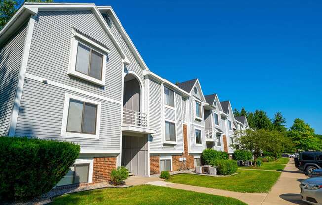 Exterior Front of Building at Canal Club Apartments in Lansing, MI