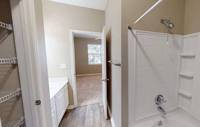 bathroom with a shower tub