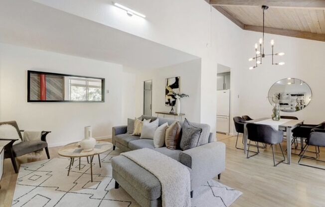 Tranquil Top-Floor End Unit with Stream Views & Resort Amenities — Blocks to Downtown