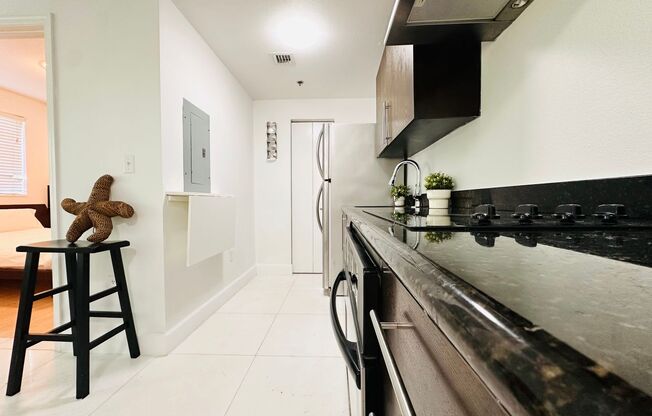 Bright and furnished 1/1 in classy remodeled Art Deco Building