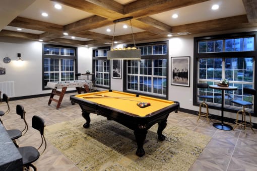 a billiards room with a yellow pool table at Willowest in Lindbergh, Atlanta, 30318