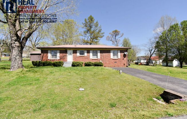 Great corner lot home in Auburntown! Garage and storage shed!