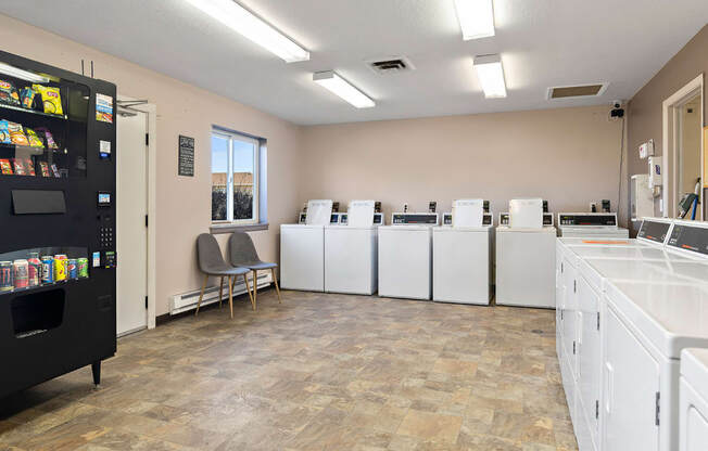 aysis room with machines and counters and a black vending machine