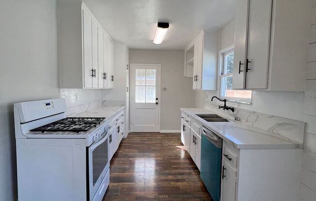South of Conant Home with 3 Bedrooms, 1 bath and beautiful Hardwood Floors!