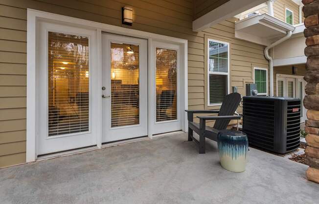 A Patio With a White Door at The Aster Apartments, Cary