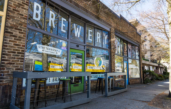 a storefront with a sign that reads brewery