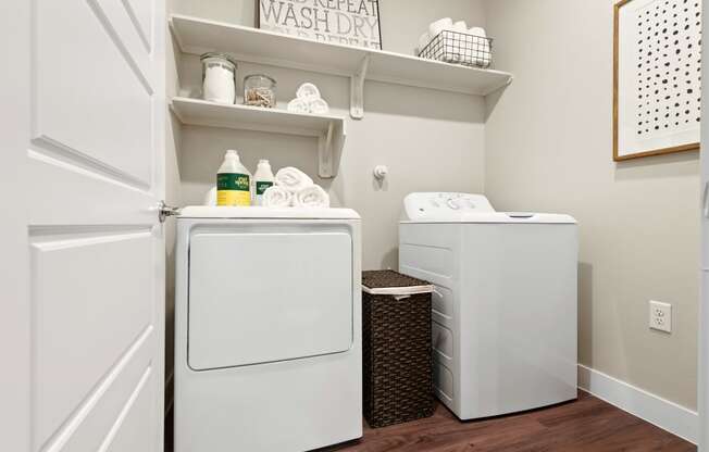 in-unit washer and dryer of an apartment at ironridge at hill country village