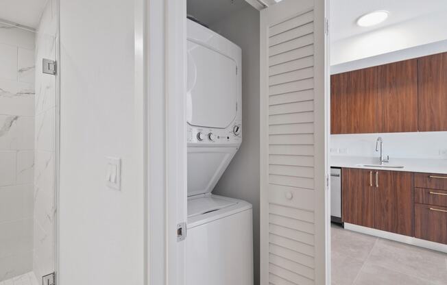 a laundry room with a washer and dryer