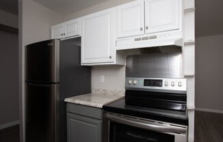 Elevate your living at Courtyards Apartments with modern kitchens featuring sleek stainless steel appliances and stylish cabinetry. Enjoy comfort and convenience in a vibrant community. Schedule your tour today!