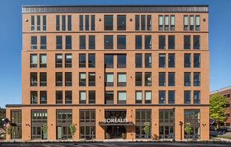 A large brick building with the word "Borealis" on the front.