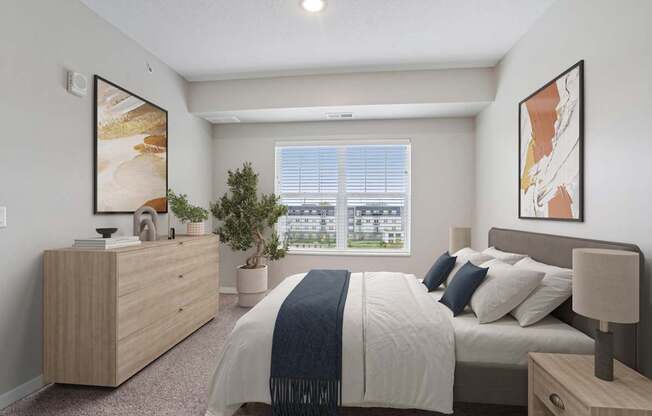 A bedroom with a large bed, a wooden dresser, and a window with a view of a cityscape.