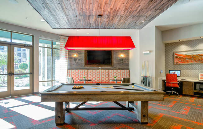 Carillon apartments in Nashville, TN photo of game room with billiards and shuffleboard