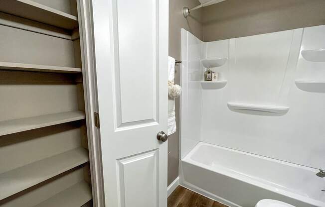 a small bathroom with a shower and a toilet