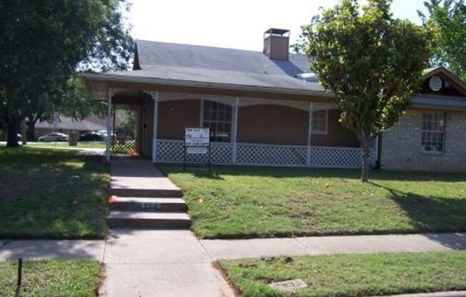 Pretty corner lot with huge trees offers a great view of this wrap around type house with exterior doors facing both Bolden and Willow Oak.