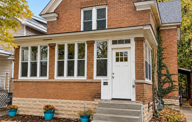 Charming Duplex Near West 7th – Hardwood Floors, Porch & Garage!
