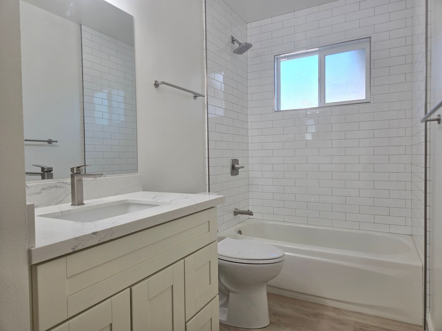 Renovated and Remodeled, New Driveway, New Yard, Kitchen and Bathrooms, Fresh Paint, Wood Floors!
