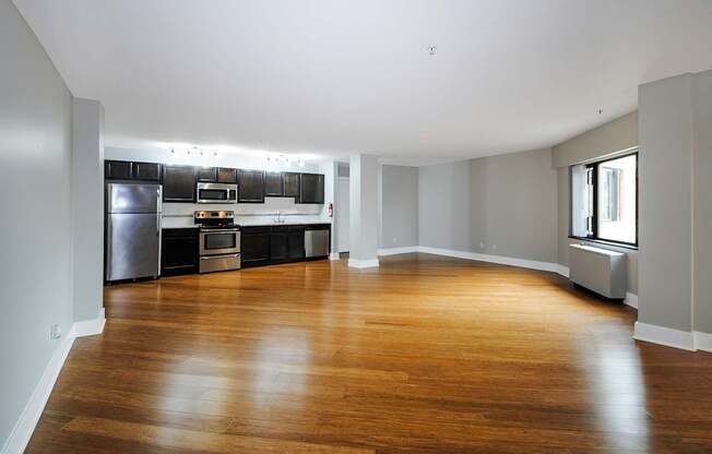 A spacious kitchen with wooden floors and modern appliances in Kalamazoo, MI