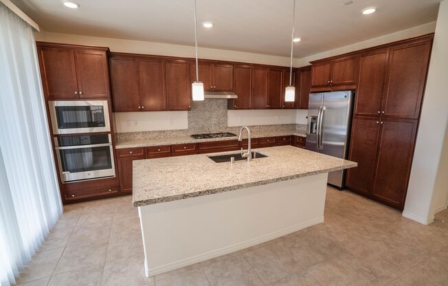 Spacious 4-Bedroom Home with Solar in Valencia's West Creek Community!