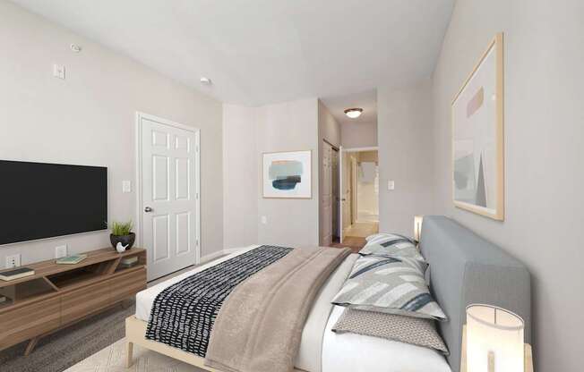 a bedroom with a large bed and a tv  at MetroPlace at Town Center, Camp Springs, 20746