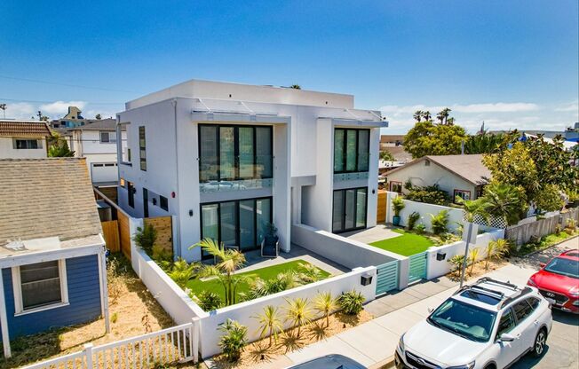 Luxury Coastal Townhome | Private Rooftop + Private Garage | Steps to the Beach