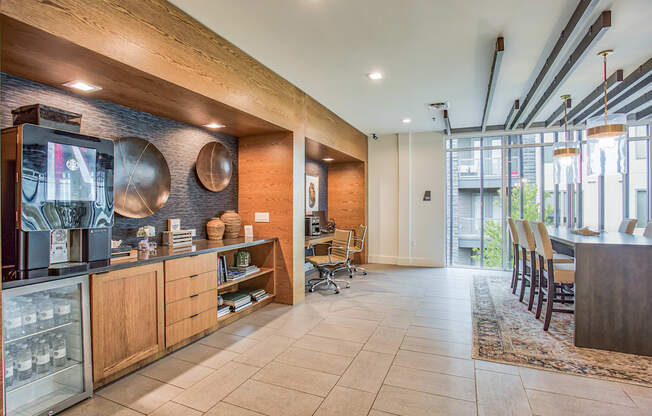 a room with a desk and chairs and a large window at Presidium Revelstoke, Fort Worth, TX, 76131
