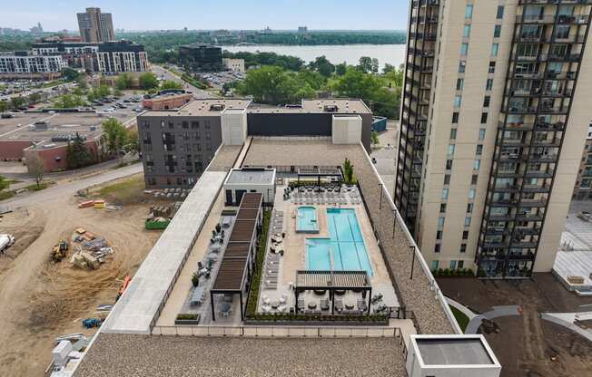 a view of the pool from the top of the building