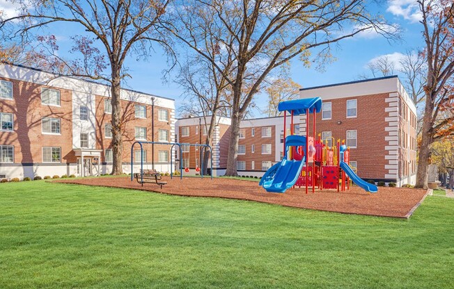 Step into a vibrant community at Icon Downtown Durham, featuring a fantastic playground surrounded by lush green space. Perfect for outdoor fun and relaxation. Explore the endless possibilities for living at Icon—schedule your tour today!
